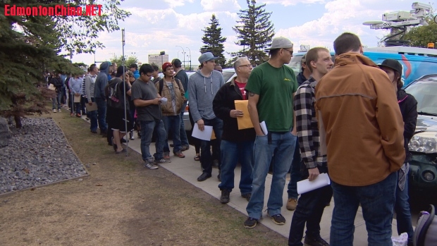 hundreds-lined-up-outside-a-building-in-south-edmonton-to-apply-for-the-fort-mcm.jpg